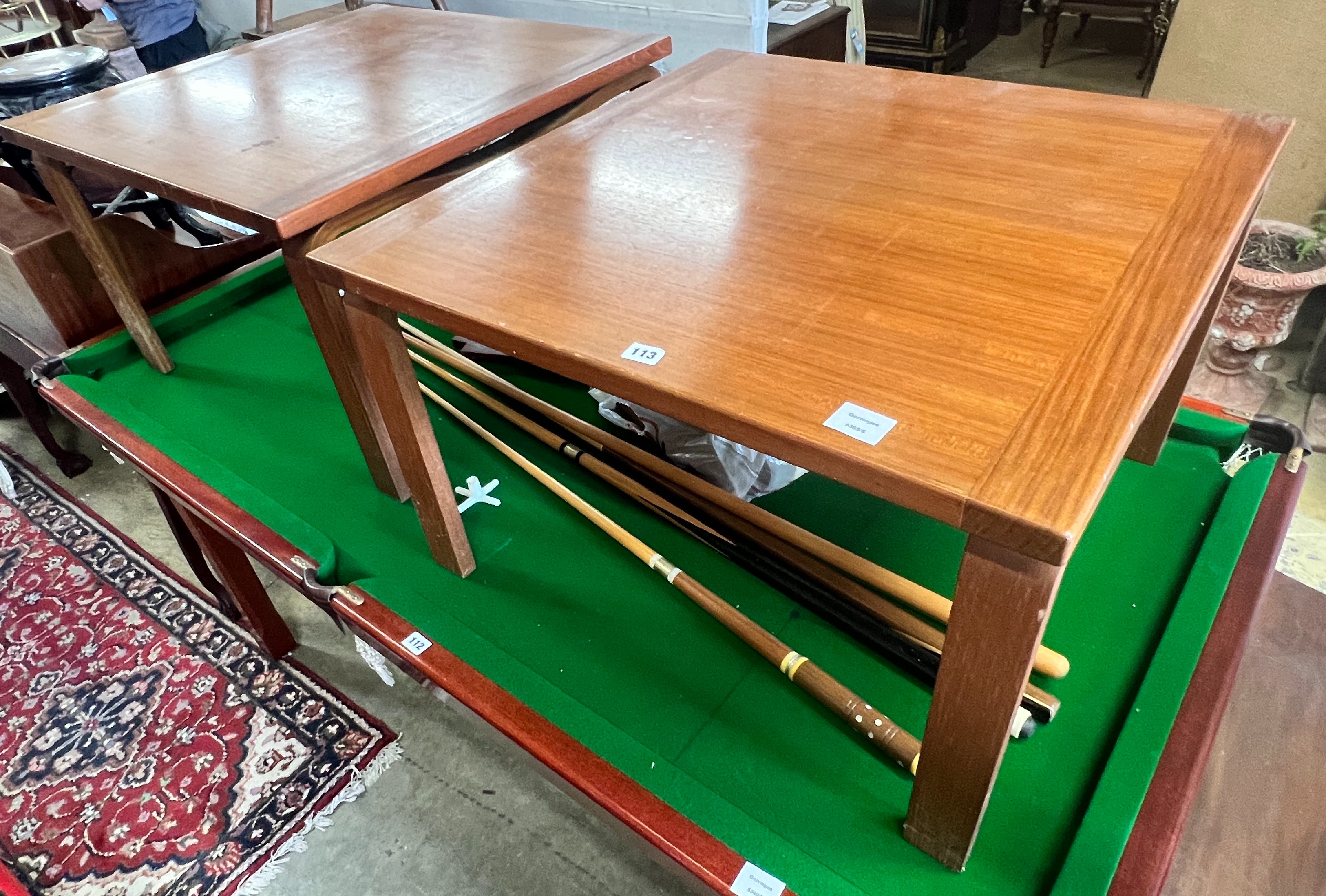 A pair of 1950's Danish teak coffee tables, width 76cm depth 76cm height 47cm